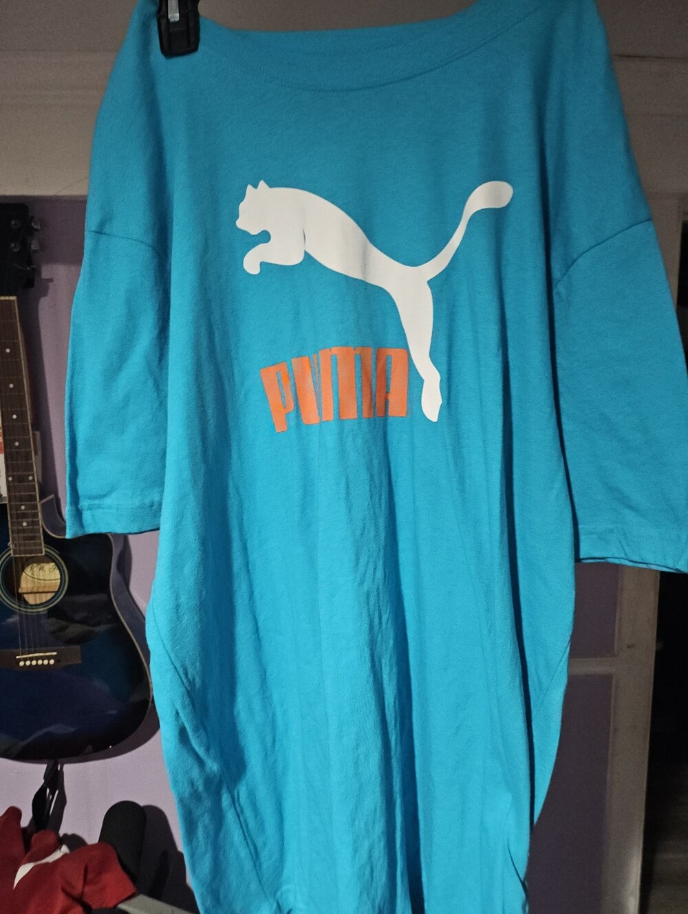 Puma Teal Tee with White Puma Logo and Orange Wordmark